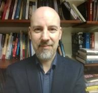 Dr Rhys Kelly, Associate Professor in Conflict Resolution in the Department of Peace Studies and International Development